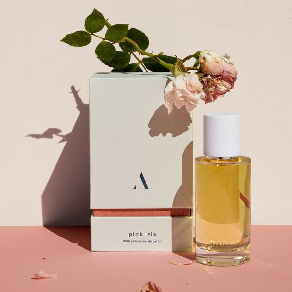 Abel Perfume Pink Iris lifestyle photo with roses