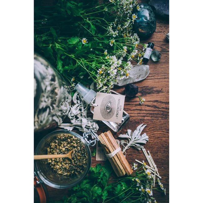 Palo Santo Protection Mist Laying on Table