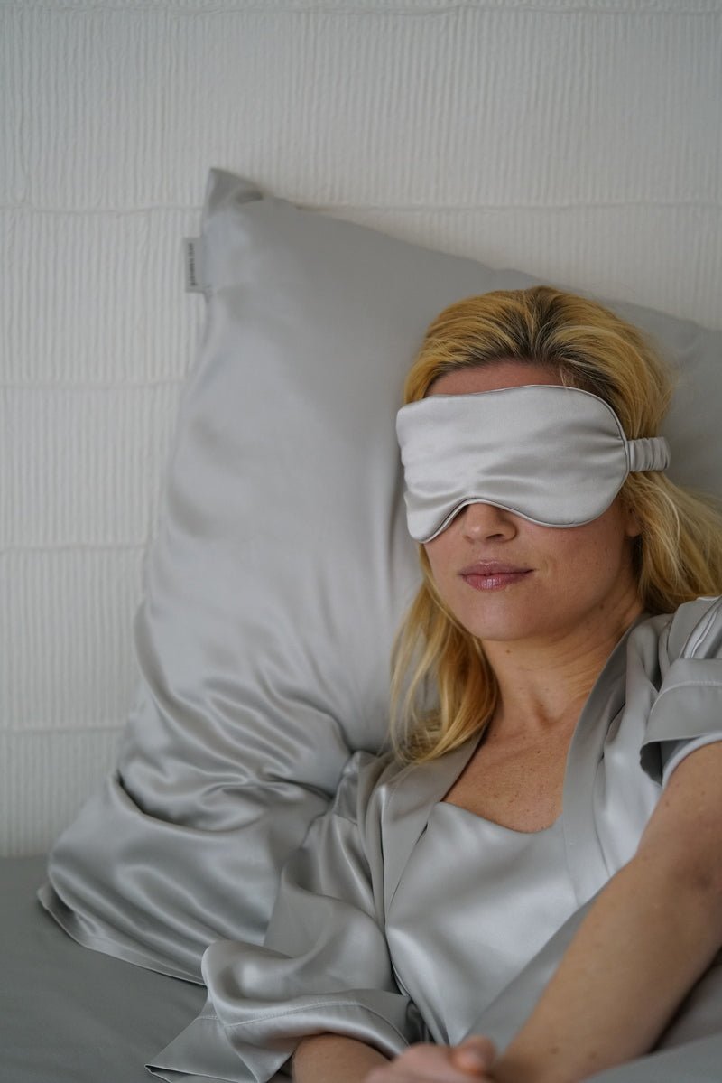 Silk Eye Mask Blush Pink Model in Bed