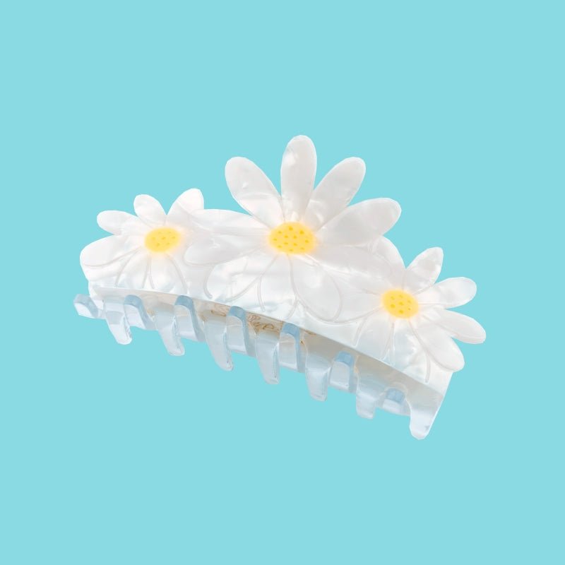 Coucou Suzette Big Daisy Hair Claw - Produktbild türkiser Hintergrund