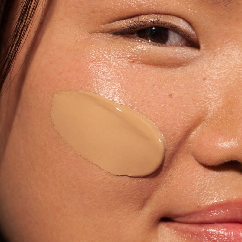 Skinonym Semi-Matte Peptide Foundation 50 Golden Sand on model