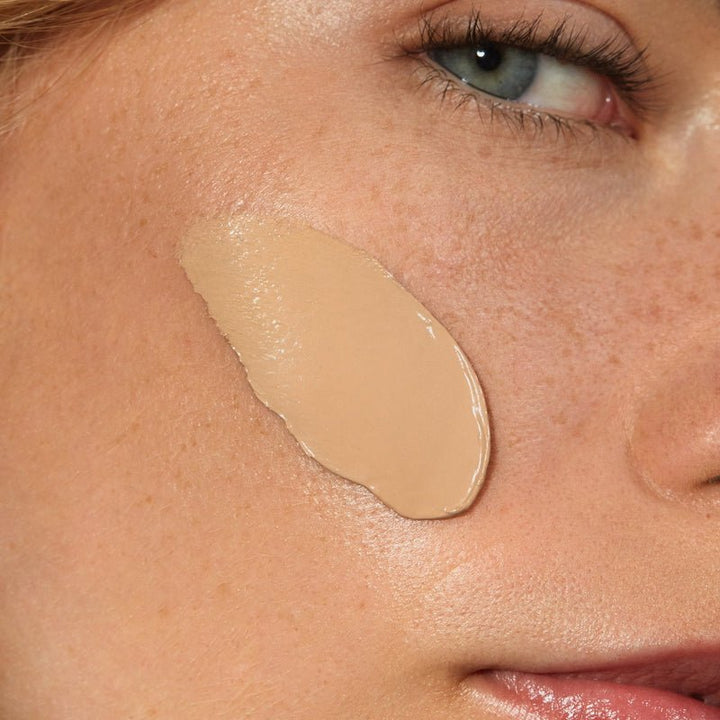 Skinonym Semi-Matte Peptide Foundation 40 Sand on model