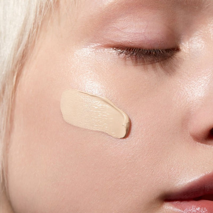 Skinonym Semi-Matte Peptide Foundation 10 Porcelain on model