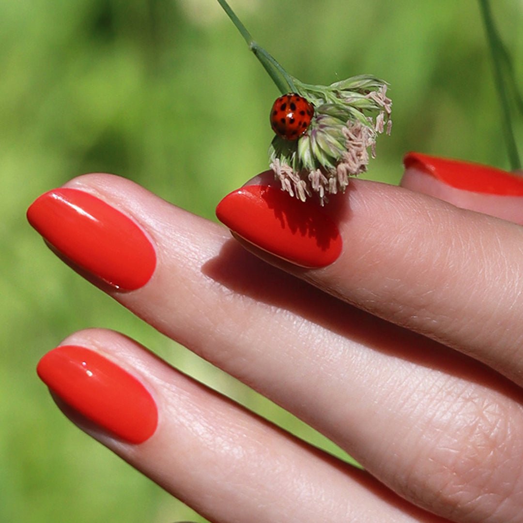 Manucurist Nagellack Red Coral - Lackierte Nägel