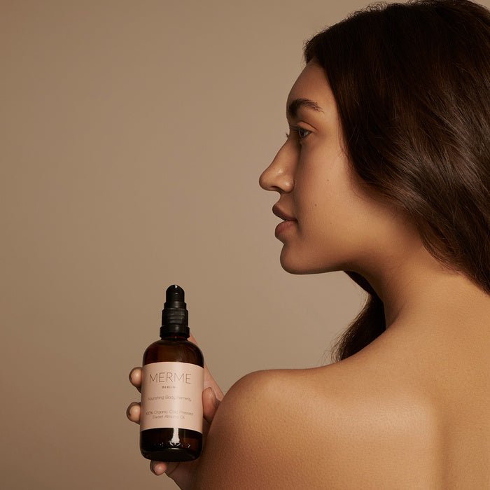 Merme Berlin Nourishing Body Remedy with model