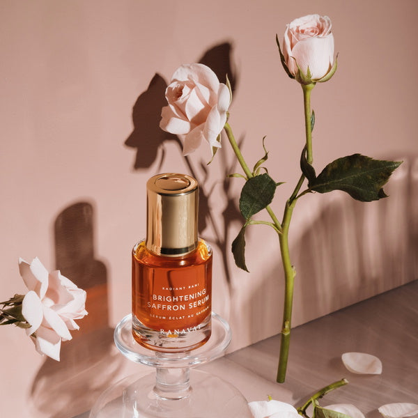 Ravanat Brightening Saffron Serum Radiant Rani - lifestyle with roses